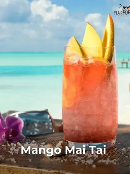 A beautiful Mango Mai Tai served on a beach. This image transports you to a tropical paradise, showcasing our love for vacation-inspired drinks.