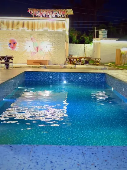 The pool is the heart of Sasa Green. It's especially beautiful at night when the underwater lights are on.