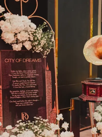 A vintage gramophone and themed signage added a touch of old-school glamour to the 'City of Dreams' entrance decor.