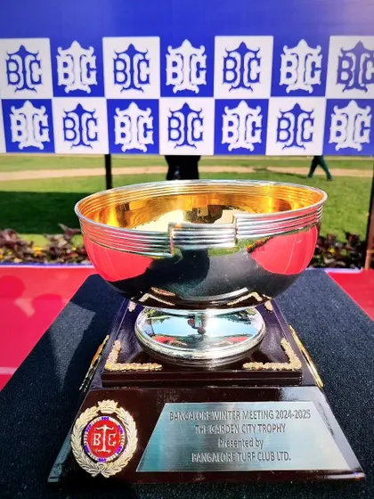 The Garden City Trophy, a gleaming silver bowl reflecting the beauty of our racecourse.
