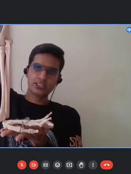 In our online anatomy sessions, we use skeletal models to demonstrate the biomechanics of joints like the elbow and wrist. This knowledge is crucial for teachers to provide safe, individualized alignment.