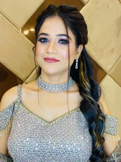 A glamorous look for an engagement or cocktail party. The silver, shimmering dress is paired with a dramatic smoky eye and a soft pink lip.
