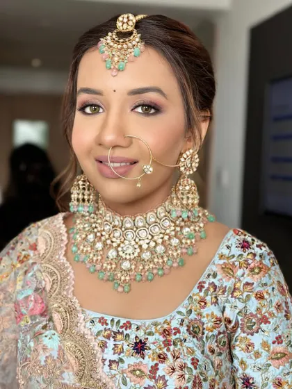 Another angle of this stunning bride, her makeup looking fresh and modern.