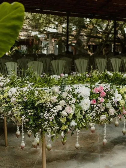 Another view of the floral-covered table, a unique and beautiful decor element.