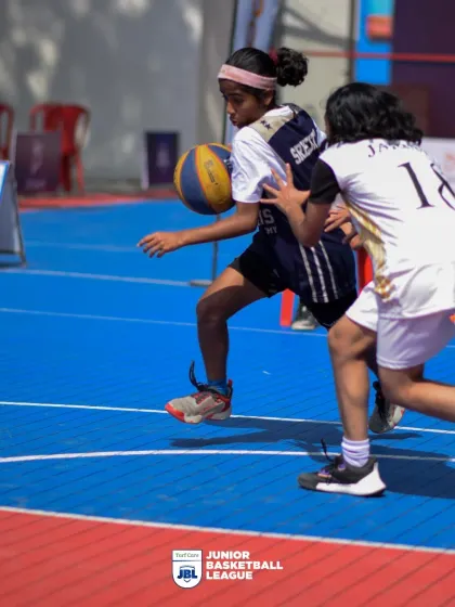 Young female athletes competing fiercely for the ball. I am a passionate advocate for gender inclusion and provide equal opportunities for girls in sports.
