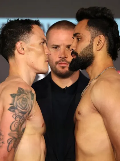 An intense stare-down. An Indian fighter going face to face with a two-time world champion.