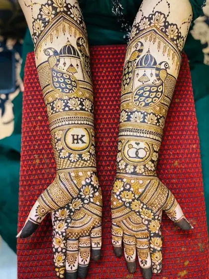 A repeat of a popular design, this shows a full bridal look with 'HK' initials and engagement rings, a favorite among my clients.