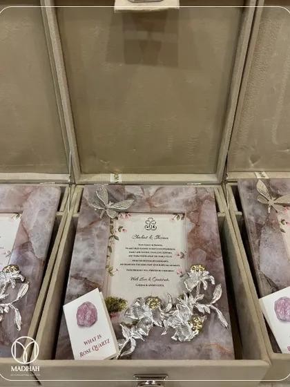 Another view of the Rose Quartz Aura Hampers, showing the delicate silver-plated dragonfly and floral details that adorn the authentic rose quartz frames. Each one is a unique piece of art.