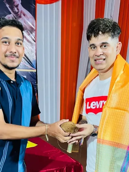 Another happy moment being felicitated for a successful community event.