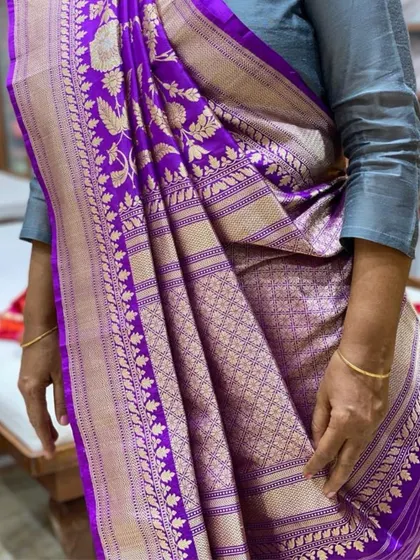 A stunning purple Banarasi saree, another example of a rich, royal color palette.