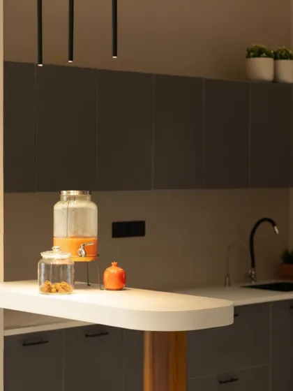 Another angle of the pantry, focusing on the upper cabinets and the simple, effective layout.
