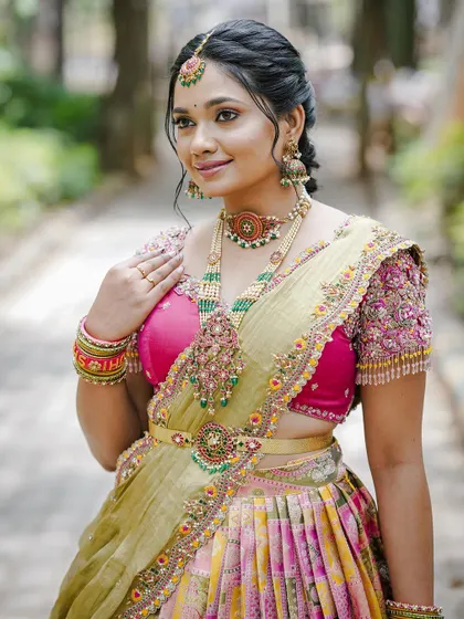 A close-up portrait from my Bhale Shastra, highlighting the intricate jewelry and the detailed embroidery of my blouse.