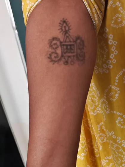 My own forearm, showing a traditional 'Acche' tattoo of Karnataka. This is a personal connection to the symbolic patterns I research.