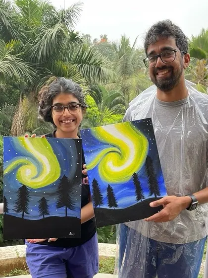This couple painted the beautiful northern lights during their private session. The lush green background of our location only added to the magical vibe.