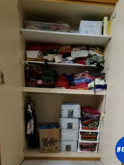 Before, this cupboard's potential was hidden by clutter. After our session, we tapped into the full space, using hanging rods for sarees and bins for blouses to create a beautiful and practical ethnic wear closet.