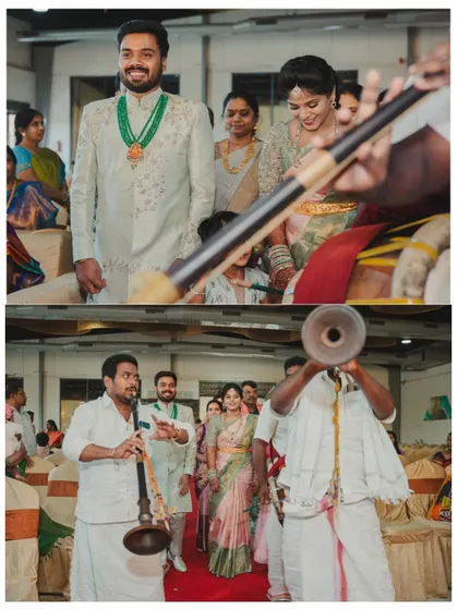 The couple's grand entrance at their South Indian wedding, accompanied by traditional Nadaswaram musicians.