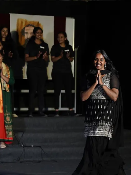 That "celebrity feeling" after a great show! Taking a bow with my students is the best reward. This shows the culmination of our hard work and the joy of a successful event choreography.