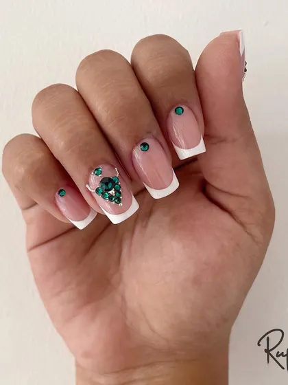 A complete look at the hand, showing how the crystal accents are balanced across the nails for a sophisticated and cohesive set.