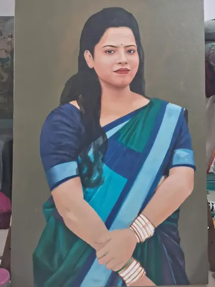 Another view of a portrait nearing completion in my studio. The surrounding environment provides context for the artistic process, showing the tools and space where your photo becomes art.