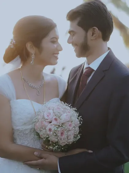A romantic close-up of a Christian couple, their faces close together, sharing a moment of pure happiness.