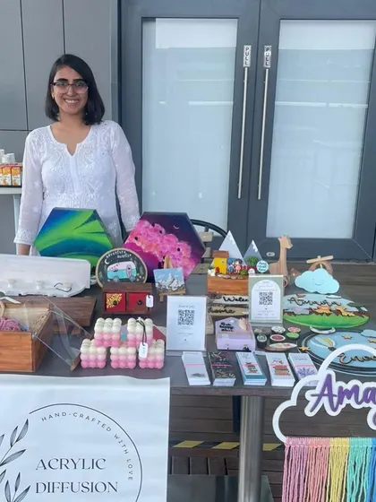 A proud moment behind my table at the women entrepreneurs event. I'm so grateful for the opportunity to share my craft.
