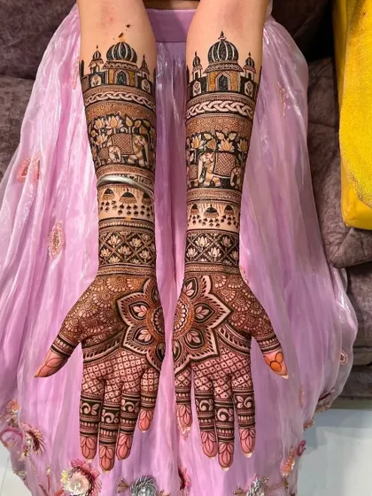 A stunning design with palace architecture at the top and bands of elephants below, creating a royal look.