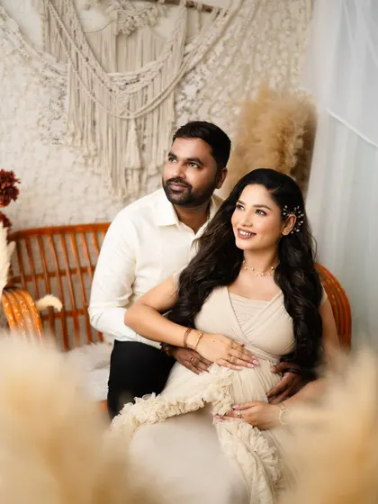 Looking forward to the future together. The pampas grass in the foreground adds a dreamy, soft-focus effect to this lovely couple's portrait.