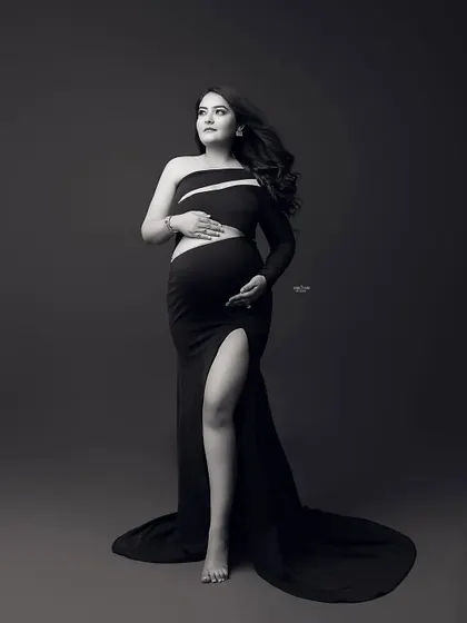 A powerful black and white portrait that uses shadows and highlights to sculpt the body. This is a key technique for creating dramatic and artistic images.