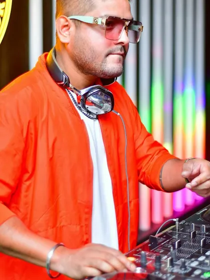 At the console at End of the Day, Koramangala. This orange bomber jacket was perfect for bringing the heat to the biggest ladies' night in town.