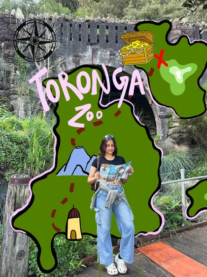 Exploring Toronga Zoo like a treasure hunt. I can create a custom map overlay on your photo, highlighting the location and adding fun, thematic illustrations.