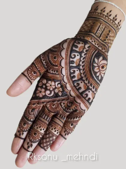 This gallery showcases a variety of my traditional designs. You'll find classic elements like peacocks, elephants, lotuses, and intricate jaali (net) patterns, all expertly crafted to create timeless beauty.
