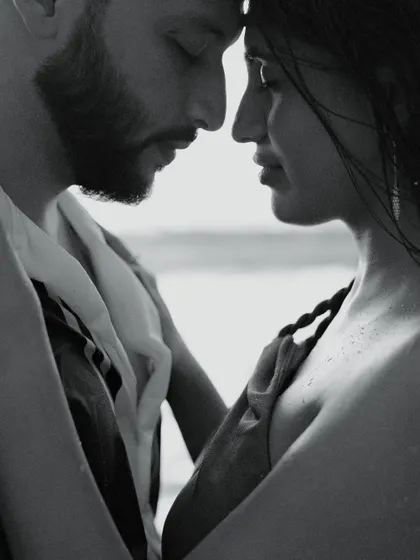 Sometimes, the most powerful stories are told in whispers. This quiet, black and white close-up from a beach shoot in Phuket strips away everything but the raw emotion and connection between two people.
