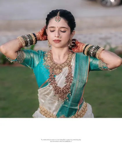 A serene portrait of the bride with her eyes closed, a moment of calm and grace on her wedding day.