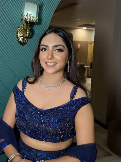 Her happy smile says it all. We love creating looks that make our clients feel this beautiful.