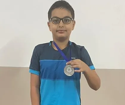 A close-up of our little champ, Laksh Malik, with his silver medal from the Under-12 category tournament held at GD Goenka School. This is just the beginning for him.