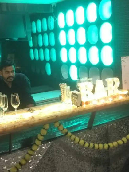 Another angle of our Diwali bar setup, showing how we integrate traditional decor with our modern, LED-lit bar.
