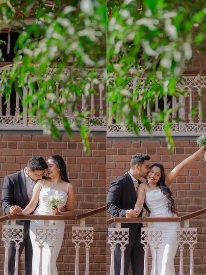 A playful and romantic moment on a balcony with a brick facade. The candid laughter and joyful expressions make this urban pre-wedding shot feel authentic and full of life.