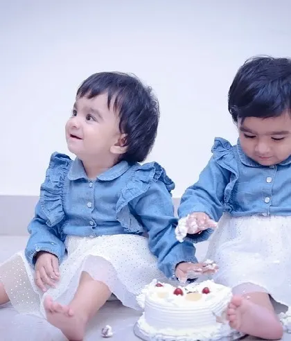 Getting their hands dirty! This is what a cake smash is all about. We capture the sensory experience and curiosity of the little ones.