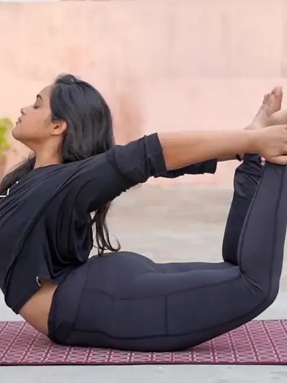 The Bow pose (Dhanurasana) is a powerful backbend that opens the entire front of the body. It's a great pose for building spinal strength and improving posture.