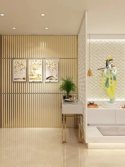 An entrance foyer in a Tata Primanti apartment featuring a dedicated pooja (prayer) space with a backlit Krishna idol.