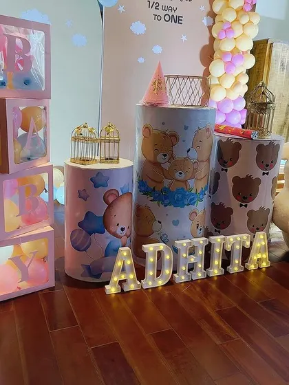 A detail shot of the teddy bear props, including themed pedestals and light-up letters.