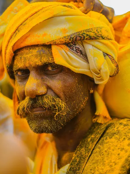 A series of striking portraits from the Pattan Kodoli festival. Each face tells a story, covered in the golden 'Bhandara' powder, reflecting deep faith and tradition.