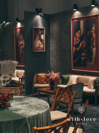 A wider view of the seating arrangement, showing how the different elements come together to create a rich, layered, and cohesive design. The space feels both grand and intimate.