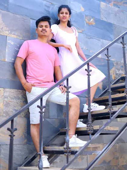 A stylish pose on a staircase. The casual outfits and confident stances give this a modern and cool vibe.