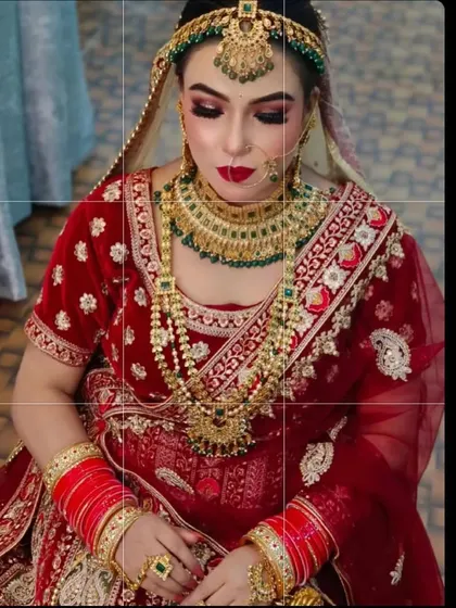A close-up of the bridal jewellery and makeup that complements the red velvet lehenga. I also offer a wide range of rental wedding jewellery to perfectly match your chosen outfit.