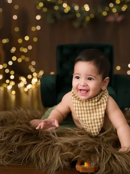 On the move! This shot captures the energy and excitement of a baby who is just starting to crawl, with a huge smile on his face.