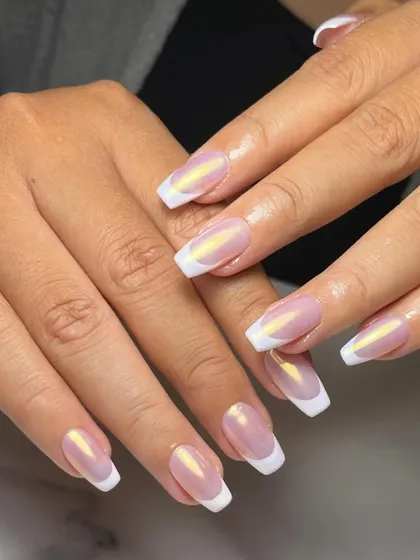 Another look at our popular glazed chrome French manicure. The subtle iridescent finish catches the light beautifully, giving a simple design a high-fashion feel.