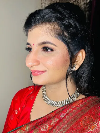A close-up of the makeup, focusing on the clean, defined eyes and natural lip color.