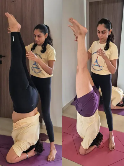 Day 2 of our Monsoon Reset retreat included lots of yoga, a sound bath, and nature walks. Here I am assisting students with their inversions.
