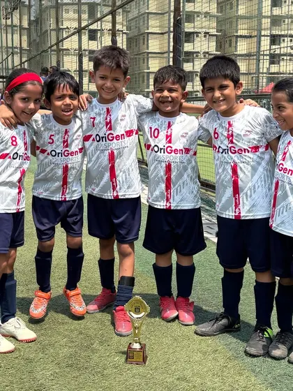 Our U7 team stands together, supporting each other after a narrow 1-0 loss in the MFA YPL. We teach our players that growth comes from both wins and losses.